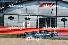 Lewis Hamilton (GBR) Mercedes AMG F1 W11 locks up under braking entering the pits. 09.08.2020. Formula 1 World Championship, Rd 5, 70th Anniversary Grand Prix, Silverstone, England, Race Day.