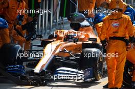 Lando Norris (GBR) McLaren MCL35 makes a pit stop. 09.08.2020. Formula 1 World Championship, Rd 5, 70th Anniversary Grand Prix, Silverstone, England, Race Day.