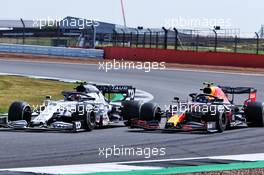 Pierre Gasly (FRA) AlphaTauri AT01 and Alexander Albon (THA) Red Bull Racing RB16 battle for position. 09.08.2020. Formula 1 World Championship, Rd 5, 70th Anniversary Grand Prix, Silverstone, England, Race Day.