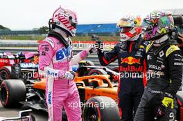 (L to R): Nico Hulkenberg (GER) Racing Point F1 Team celebrates his third position in qualifying parc ferme with Max Verstappen (NLD) Red Bull Racing and Daniel Ricciardo (AUS) Renault F1 Team. 08.08.2020. Formula 1 World Championship, Rd 5, 70th Anniversary Grand Prix, Silverstone, England, Qualifying Day.