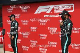 Valtteri Bottas (FIN) Mercedes AMG F1 W11 and Lewis Hamilton (GBR) Mercedes AMG F1 W11. 08.08.2020. Formula 1 World Championship, Rd 5, 70th Anniversary Grand Prix, Silverstone, England, Qualifying Day.