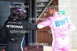 Lewis Hamilton (GBR) Mercedes AMG F1 W11 and Nico Hulkenberg (GER) Racing Point F1 Team RP20. 08.08.2020. Formula 1 World Championship, Rd 5, 70th Anniversary Grand Prix, Silverstone, England, Qualifying Day.