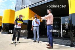 (L to R): Cyril Abiteboul (FRA) Renault Sport F1 Managing Director with Mark Webber (AUS) Channel 4 Presenter and Steve Jones (GBR) Channel 4 F1 Presenter. 08.08.2020. Formula 1 World Championship, Rd 5, 70th Anniversary Grand Prix, Silverstone, England, Qualifying Day.