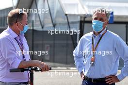 (L to R): Martin Brundle (GBR) Sky Sports Commentator with Chase Carey (USA) Formula One Group Chairman. 08.08.2020. Formula 1 World Championship, Rd 5, 70th Anniversary Grand Prix, Silverstone, England, Qualifying Day.