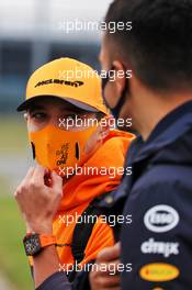 (L to R): Lando Norris (GBR) McLaren with Alexander Albon (THA) Red Bull Racing. 09.08.2020. Formula 1 World Championship, Rd 5, 70th Anniversary Grand Prix, Silverstone, England, Race Day.