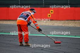 Circuit atmosphere - marshals sweep clean the circuit. 09.08.2020. Formula 1 World Championship, Rd 5, 70th Anniversary Grand Prix, Silverstone, England, Race Day.