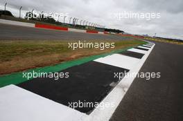 The curb at Chapel corner has been extended to help stop the drivers cutting the corner on the exit of Becketts. 06.08.2020. Formula 1 World Championship, Rd 5, 70th Anniversary Grand Prix, Silverstone, England, Preparation Day.