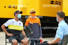 Daniel Ricciardo (AUS) Renault F1 Team with Lando Norris (GBR) McLaren and Jenson Button (GBR) Sky Sports F1 Presenter. 06.08.2020. Formula 1 World Championship, Rd 5, 70th Anniversary Grand Prix, Silverstone, England, Preparation Day.
