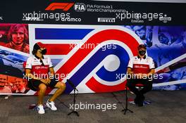 (L to R): Antonio Giovinazzi (ITA) Alfa Romeo Racing and team mate Kimi Raikkonen (FIN) Alfa Romeo Racing in the FIA Press Conference. 06.08.2020. Formula 1 World Championship, Rd 5, 70th Anniversary Grand Prix, Silverstone, England, Preparation Day.
