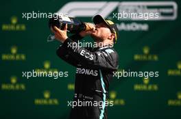 Race winner Valtteri Bottas (FIN) Mercedes AMG F1 celebrates on the podium. 05.07.2020. Formula 1 World Championship, Rd 1, Austrian Grand Prix, Spielberg, Austria, Race Day.