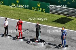 The podium (L to R): Charles Leclerc (MON) Ferrari, second; Valtteri Bottas (FIN) Mercedes AMG F1, race winner; Lando Norris (GBR) McLaren, third. 05.07.2020. Formula 1 World Championship, Rd 1, Austrian Grand Prix, Spielberg, Austria, Race Day.