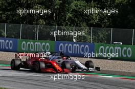Sebastian Vettel (GER) Ferrari SF1000 and Daniil Kvyat (RUS) AlphaTauri AT01 battle for position. 05.07.2020. Formula 1 World Championship, Rd 1, Austrian Grand Prix, Spielberg, Austria, Race Day.