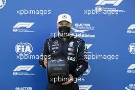 Valtteri Bottas (FIN) Mercedes AMG F1 celebrates his pole position in qualifying parc ferme. 04.07.2020. Formula 1 World Championship, Rd 1, Austrian Grand Prix, Spielberg, Austria, Qualifying Day.