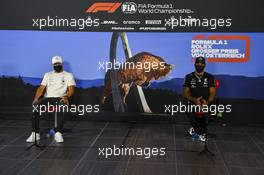 (L to R): Valtteri Bottas (FIN) Mercedes AMG F1 and Lewis Hamilton (GBR) Mercedes AMG F1 in the FIA Press Conference. 02.07.2020. Formula 1 World Championship, Rd 1, Austrian Grand Prix, Spielberg, Austria, Preparation Day.