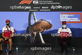 (L to R): Antonio Giovinazzi (ITA) Alfa Romeo Racing and Kimi Raikkonen (FIN) Alfa Romeo Racing in the FIA Press Conference. 02.07.2020. Formula 1 World Championship, Rd 1, Austrian Grand Prix, Spielberg, Austria, Preparation Day.