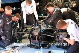 Mercedes AMG F1 W11 worked on by mechanics. 20.02.2020. Formula One Testing, Day Two, Barcelona, Spain. Thursday.