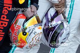 The helmets of Max Verstappen (NLD) Red Bull Racing and Lewis Hamilton (GBR) Mercedes AMG F1 at a drivers group photograph.  19.02.2020. Formula One Testing, Day One, Barcelona, Spain. Wednesday.