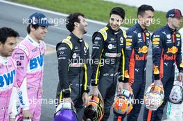 (L to R): Daniel Ricciardo (AUS) Renault F1 Team and Esteban Ocon (FRA) Renault F1 Team at a drivers group photograph. 19.02.2020. Formula One Testing, Day One, Barcelona, Spain. Wednesday.