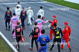 Sergio Perez (MEX) Racing Point F1 Team and Sebastian Vettel (GER) Ferrari at a drivers group photograph. 19.02.2020. Formula One Testing, Day One, Barcelona, Spain. Wednesday.