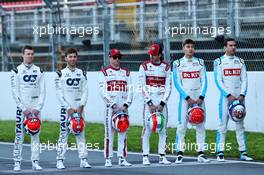 (L to R): Daniil Kvyat (RUS) AlphaTauri; Pierre Gasly (FRA) AlphaTauri; Kimi Raikkonen (FIN) Alfa Romeo Racing; Antonio Giovinazzi (ITA) Alfa Romeo Racing; George Russell (GBR) Mercedes AMG F1 Test Driver; Nicholas Latifi (CDN) Williams Racing, at a drivers group photograph.  19.02.2020. Formula One Testing, Day One, Barcelona, Spain. Wednesday.
