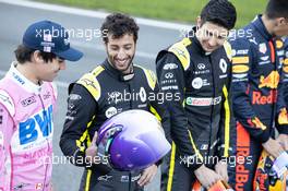 Daniel Ricciardo (AUS) Renault F1 Team and Lance Stroll (CDN) Racing Point F1 Team at a drivers group photograph. 19.02.2020. Formula One Testing, Day One, Barcelona, Spain. Wednesday.
