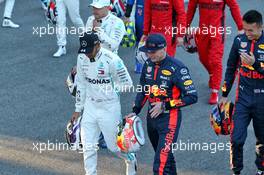Lewis Hamilton (GBR) Mercedes AMG F1 and Max Verstappen (NLD) Red Bull Racing at a drivers group photograph. 19.02.2020. Formula One Testing, Day One, Barcelona, Spain. Wednesday.