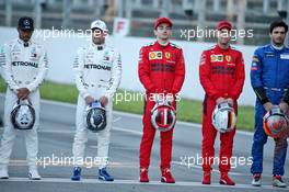 (L to R): Lewis Hamilton (GBR) Mercedes AMG F1; Valtteri Bottas (FIN) Mercedes AMG F1; Charles Leclerc (MON) Ferrari; Sebastian Vettel (GER) Ferrari, at a drivers group photograph. 19.02.2020. Formula One Testing, Day One, Barcelona, Spain. Wednesday.