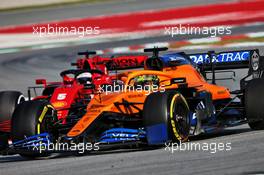 Lando Norris (GBR) McLaren MCL35 and Sebastian Vettel (GER) Ferrari SF1000. 27.02.2020. Formula One Testing, Day Two, Barcelona, Spain. Thursday.