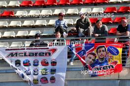 McLaren banners and fans in the grandstand. 26.02.2020. Formula One Testing, Day One, Barcelona, Spain. Wednesday.