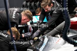 Mercedes AMG F1 mechanics work on the Mercedes AMG F1 W11. 26.02.2020. Formula One Testing, Day One, Barcelona, Spain. Wednesday.