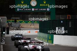 Lewis Hamilton (GBR) Mercedes AMG F1 W11; Antonio Giovinazzi (ITA) Alfa Romeo Racing C39; and Kimi Raikkonen (FIN) Alfa Romeo Racing C39. 28.08.2020. Formula 1 World Championship, Rd 7, Belgian Grand Prix, Spa Francorchamps, Belgium, Practice Day.