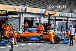 The McLaren MCL35 of non-starter Carlos Sainz Jr (ESP) is pushed back to the pit garage before the start of the race. 30.08.2020. Formula 1 World Championship, Rd 7, Belgian Grand Prix, Spa Francorchamps, Belgium, Race Day.