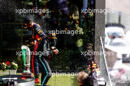 Race winner Lewis Hamilton (GBR) Mercedes AMG F1 celebrates with Max Verstappen (NLD) Red Bull Racing on the podium. 30.08.2020. Formula 1 World Championship, Rd 7, Belgian Grand Prix, Spa Francorchamps, Belgium, Race Day.