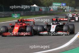 Charles Leclerc (MON) Ferrari SF1000 and Romain Grosjean (FRA) Haas F1 Team VF-20 battle for position. 30.08.2020. Formula 1 World Championship, Rd 7, Belgian Grand Prix, Spa Francorchamps, Belgium, Race Day.