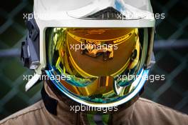 Daniil Kvyat (RUS) AlphaTauri AT01 reflected in a fireman's helmet visor. 29.08.2020. Formula 1 World Championship, Rd 7, Belgian Grand Prix, Spa Francorchamps, Belgium, Qualifying Day.