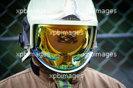 Lewis Hamilton (GBR) Mercedes AMG F1 W11 reflected in a fireman's helmet visor. 29.08.2020. Formula 1 World Championship, Rd 7, Belgian Grand Prix, Spa Francorchamps, Belgium, Qualifying Day.