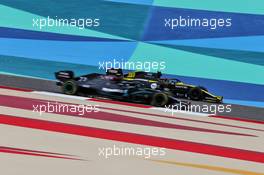 Esteban Ocon (FRA) Renault F1 Team RS20 passes Valtteri Bottas (FIN) Mercedes AMG F1 W11. 27.11.2020. Formula 1 World Championship, Rd 15, Bahrain Grand Prix, Sakhir, Bahrain, Practice Day