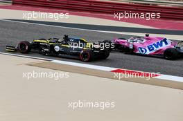 Daniel Ricciardo (AUS) Renault F1 Team RS20 and Sergio Perez (MEX) Racing Point F1 Team RP19. 27.11.2020. Formula 1 World Championship, Rd 15, Bahrain Grand Prix, Sakhir, Bahrain, Practice Day
