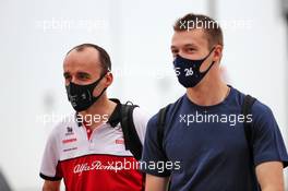(L to R): Robert Kubica (POL) Alfa Romeo Racing Reserve Driver with Daniil Kvyat (RUS) AlphaTauri. 27.11.2020. Formula 1 World Championship, Rd 15, Bahrain Grand Prix, Sakhir, Bahrain, Practice Day
