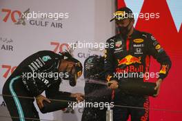1st place Lewis Hamilton (GBR) Mercedes AMG F1 W11 and 3rd place Alexander Albon (THA) Red Bull Racing RB16. 29.11.2020. Formula 1 World Championship, Rd 15, Bahrain Grand Prix, Sakhir, Bahrain, Race Day.