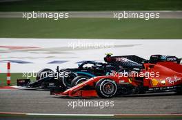 Sebastian Vettel (GER) Ferrari SF1000 and Charles Leclerc (MON) Ferrari SF1000 battle for position. 29.11.2020. Formula 1 World Championship, Rd 15, Bahrain Grand Prix, Sakhir, Bahrain, Race Day.