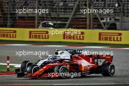 Sebastian Vettel (GER) Ferrari SF1000 and Nicholas Latifi (CDN) Williams Racing FW43 battle for position. 29.11.2020. Formula 1 World Championship, Rd 15, Bahrain Grand Prix, Sakhir, Bahrain, Race Day.