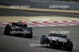 Kevin Magnussen (DEN) Haas VF-20 and Valtteri Bottas (FIN) Mercedes AMG F1 W11. 29.11.2020. Formula 1 World Championship, Rd 15, Bahrain Grand Prix, Sakhir, Bahrain, Race Day.