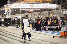 Alexander Albon (THA) Red Bull Racing in the pits while the race is stopped. 29.11.2020. Formula 1 World Championship, Rd 15, Bahrain Grand Prix, Sakhir, Bahrain, Race Day.