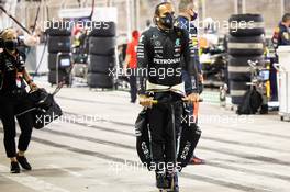 Lewis Hamilton (GBR) Mercedes AMG F1 in the pits while the race is stopped. 29.11.2020. Formula 1 World Championship, Rd 15, Bahrain Grand Prix, Sakhir, Bahrain, Race Day.