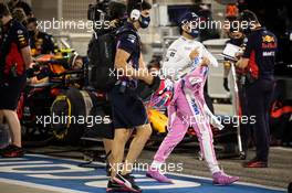 Sergio Perez (MEX) Racing Point F1 Team in the pits while the race is stopped. 29.11.2020. Formula 1 World Championship, Rd 15, Bahrain Grand Prix, Sakhir, Bahrain, Race Day.