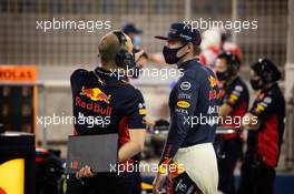 Max Verstappen (NLD) Red Bull Racing with Gianpiero Lambiase (ITA) Red Bull Racing Engineer in the pits while the race is stopped. 29.11.2020. Formula 1 World Championship, Rd 15, Bahrain Grand Prix, Sakhir, Bahrain, Race Day.