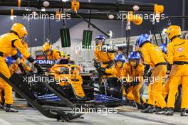 Lando Norris (GBR) McLaren MCL35 makes a pit stop. 29.11.2020. Formula 1 World Championship, Rd 15, Bahrain Grand Prix, Sakhir, Bahrain, Race Day.