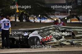 The heavily damaged Haas F1 Team VF-20 of Romain Grosjean (FRA) Haas F1 Team after crashed at the start of the race and exploded into flames, destroying the armco barrier. 29.11.2020. Formula 1 World Championship, Rd 15, Bahrain Grand Prix, Sakhir, Bahrain, Race Day.