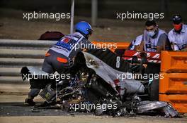 The heavily damaged Haas F1 Team VF-20 of Romain Grosjean (FRA) Haas F1 Team after crashed at the start of the race and exploded into flames, destroying the armco barrier. 29.11.2020. Formula 1 World Championship, Rd 15, Bahrain Grand Prix, Sakhir, Bahrain, Race Day.